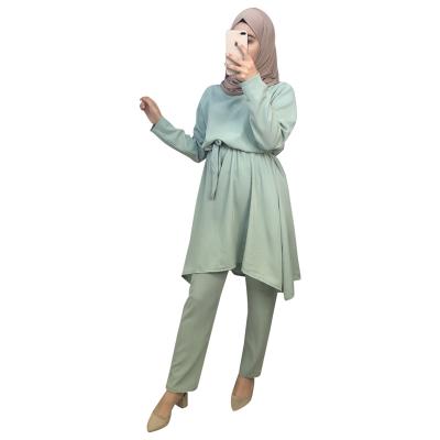 China Factory Direct Sales QUICK DRY Muslim Women Sets Clothing Wear Asymmetry Edge Soild Color Skirt 2 Piece Set for sale