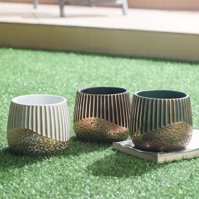 China With Drainage Hole Farmhouse Garden Accessories Gold Cement Embossed Material Pots For Live Succulent Plants Green for sale