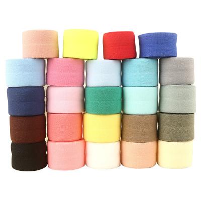 China Factory sales color elastic bias tape edge wrap elastic band rolling webbing nylon fold over elastic for garment bias à venda