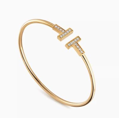 China T Brazalete de alambre de diamante Oro amarillo 18KT para mujeres ODM China Fábrica de joyas en venta