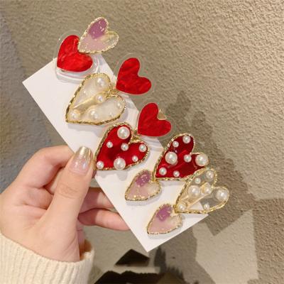 China Korean-style Japan and Japan Imitation Pearl Decorated Acrylic Red Heart Hair Clips Hairpins Accessories Girls for sale