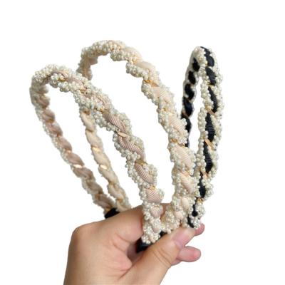 China 2021 New Style Hair Accessories Korean Fashionable Pearl Decorated Japan And Wave Shape Twisted Hair Bands Headbands For Women Headwear for sale