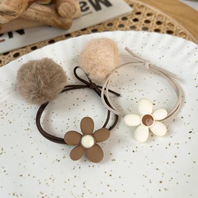 China Japan Flower Knotted Elastic Pom Pom Hair and Korean Style Women Girls Hair Accessories New Beautiful Gather Scrunchies Wholesale for sale