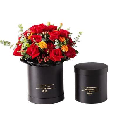 China Handgefertigtes Custom Goldfolie Logo Schwarze Blumenhut Geschenkbox für frische Blumen Verpackung zu verkaufen