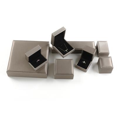 China Custom Logo Printed Small Packaging Boxes Paper Ring Necklace Bangle Jewelry Gift Box for sale