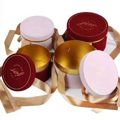 China Gold Foil Logo Round Velvet Rose Flower Hat Box Small Mothers Day Gift Box with Ribbon for sale