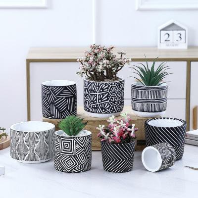 China Modern Nordic style cylindrical cement indoor simple flower pot painted fashion succulent flower pot for sale