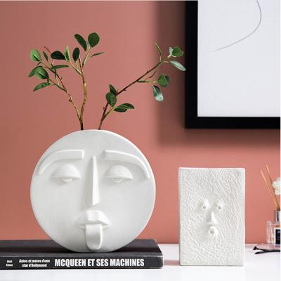 China Modern Nordic Abstract Art Face CIA Ceramic Vase for Home Office Indoor Home Office for sale