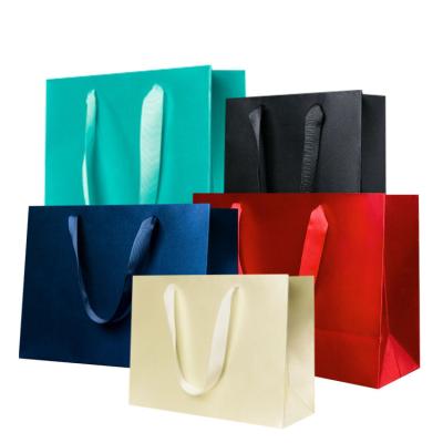 China Recyclable Brown Kraft Gift Craft Cardboard Shopping White Paper Bag With Your Own Logo Printing Hot Stamping For Ribbon Handles for sale