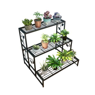 China Garden Iron Potted Art Flower Holder Modern Display Flower Shelf Rack for sale