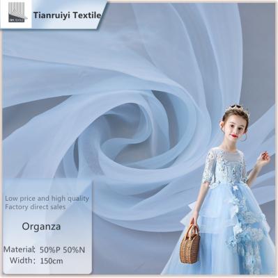 China Stain Repellent 50 Shuttle High Density Organza No Yarn Lightweight Wedding Dress Wedding Cloth Children's Clothing Sarongs Cloth Organza for sale