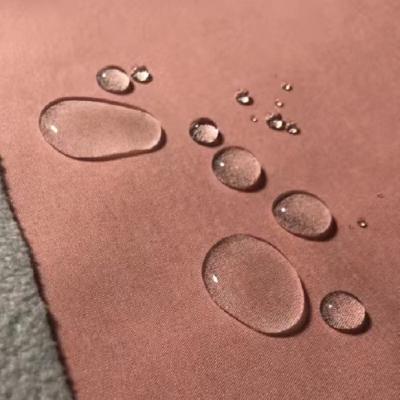 China Waterproof and Breathable TPU Fleece Tear-resistant Fabric Membrane Stretch Together 100D Polyester Fabric Softshell Jacket Fabric for sale