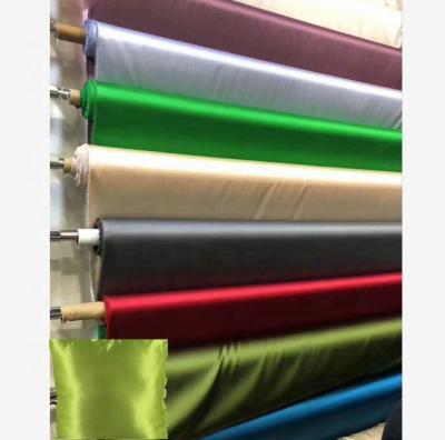 China Waterproof can be customized fabric popular fashion pillow shinny fabrics polyester satin fabrics for sale