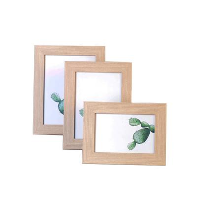 China 2021 Pastoral OEM Stylish Modern Photo Frame Gallery Picture Frame Wood For Wall And Table for sale