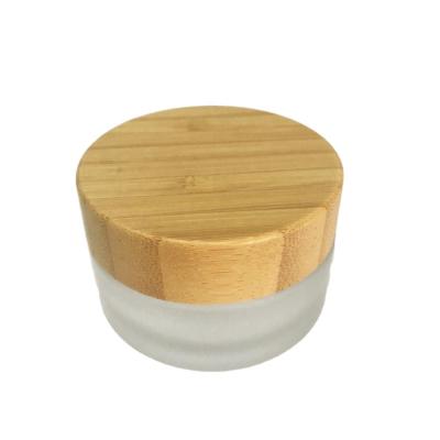 China Popular Skin Care Cream 10g 20g 30g 50g Frosted Glass Jars With Bamboo Lid Storage for sale