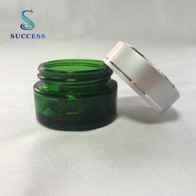 China Skin Care 20g 20ml Cream Green Face Cream Glass Jar With Silver Aluminum Cap for sale