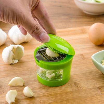 China Sustainable Garlic Presses Manual Garlic Grinder Garlic Tools Kitchen Supplies Instruments Curve Presses Fruit Tools for sale