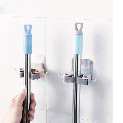 China Viable Free Punch Wall Handicap Toilet Broom Towel Hook Bathroom Kitchen Strong Adhesive Remover Paddle Wipes Clamp for sale