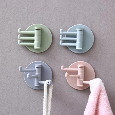 China Art Decor Multifunctional Bathroom Hook Without Punching Traceless Hanger Hook Powerful Revolving 3-prong Kitchen Storage for sale