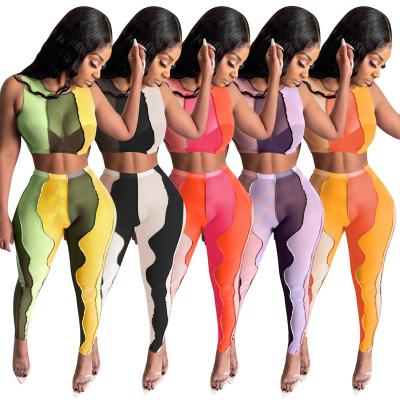 China Fashion QUICK DRY Mesh Clothing Women Plus Size Irregular Color Draw Splicing Tight Suit Two Piece Shape Sleeveless for sale