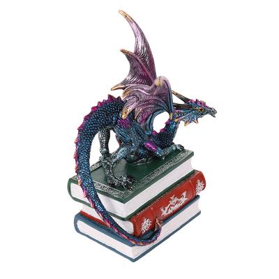 China High Poly Artificial Simulation Dragon On Book Dragon Statue Blue for sale