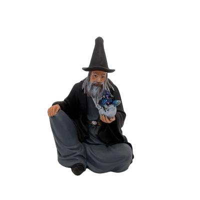 China Artificial Made In China Polyresin Wizard Dragon Statue On Hand for sale