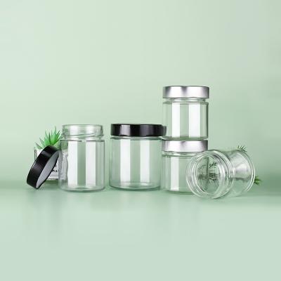 China 50ml 100ml 150ml 250ml 300ml 500ml Multifunctional Eco-Friendly Honey Spice Pudding Jar Round Food Storage Glass Jar With Aluminum Screw Lid for sale