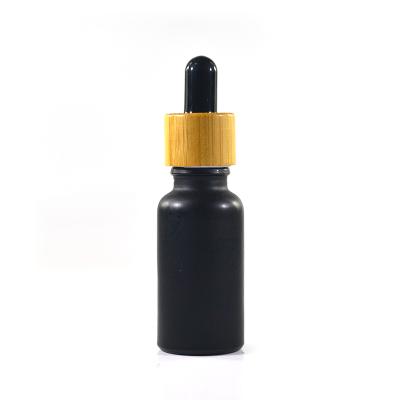 China 1oz 2oz 30ml 50ml 60ml 100ml Eco-friendly Matte Black Glass Essential Bottle Multifunctional With Different Cap for sale