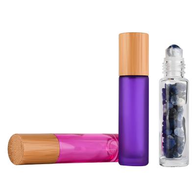 China Eco-Friendly Essential Oil 4ml 5ml 8ml 10ml 15ml Multifunctional Custom Color Roll On Glass Bottle For Perfume With Bamboo Lid for sale