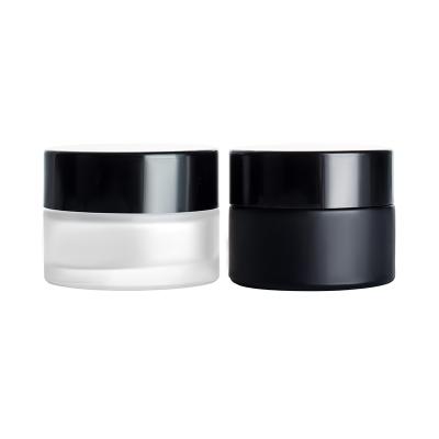 China 5ml 10ml 30ml 50g 50ml 5g 10g 15g 20g 30g 100g Multifunctional Wholesale Custom Black Round Cosmetic Face Cream Small Glass Jars With Lids for sale