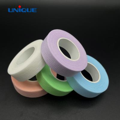 China Eyelash Pore Logo Soft Purple Strip Medical Grade Breathable Micro Tape For Eyelash Extension Easy To Tear for sale