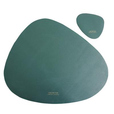 China Modern Design Irregular Durable Waterproof PU Faux Leather Table Place Mat Set for sale