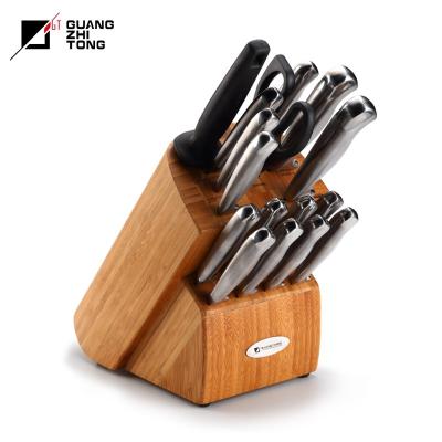 China Disposable 17 Pcs Hollow Out Stainless Steel Handle Kitchen Knife Set With Wooden Knife Block for sale