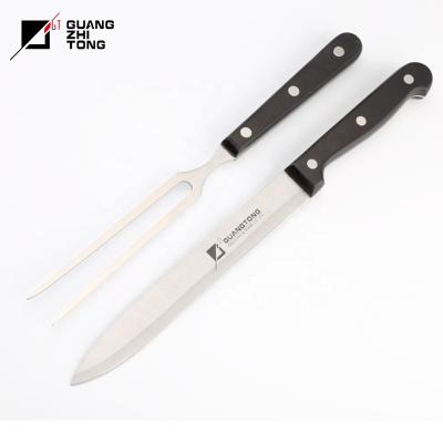 China Disposable hot sale 2 pcs GRILL kitchen stainless steel pom handle carving meat knife and fork set for sale