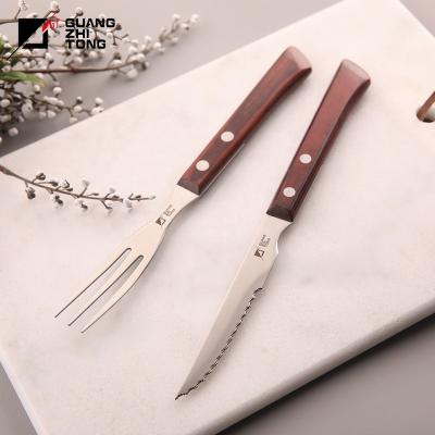 China Disposable hot sale pakkawood handle steak knife and fork set for kitchen for sale