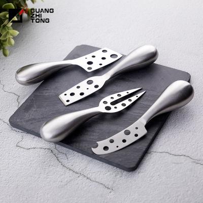 China 4 Pcs Sustainable High Quality Hollow Stainless Steel Handle Cheese Knife Set for sale