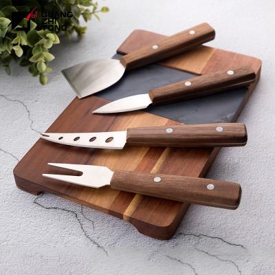 China Sustainable New Design 4 Pcs Wooden Black Walnut Handle Cheese Knife Set for sale