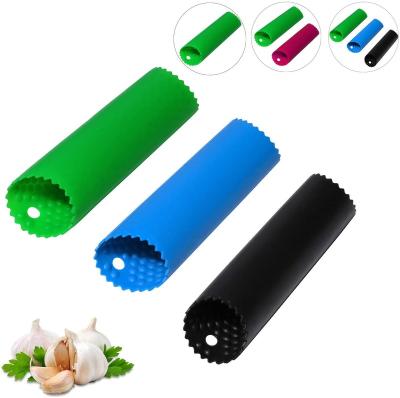 China Viable Kitchen Accessories Garlic Roller Peeling Clove Colorful Tube Kitchen Instrument Tool Silicone Garlic Press Peeler for sale