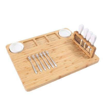 China Sustainable Bamboo Cheese Board With Ceramic Cutting Tool 4 Piece Set Cutting Board With Fruit Fork Grocery for sale