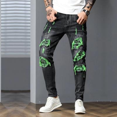 China Breathable Custom Ripped Spliced ​​Green Letter Washed Zipper Fly Street Wear Pantalones De Hombre Jeans for sale