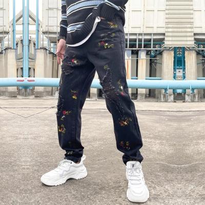 China Breathable Fashion Ripped Rose Embroidery Black Washed Street Wear Casual Pantalones De Hombre Jeans for sale