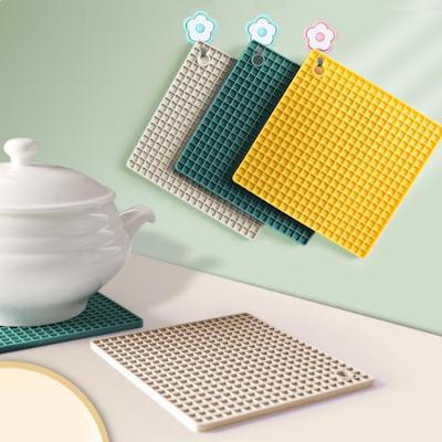 China Hot Pan Silicon Holders Rectangular Pad Coaster Pot Silicone Honeycomb Tripod Mat Heat Resistant Viable for sale