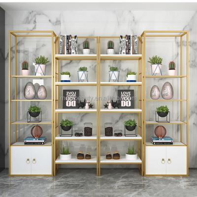 China Modern Gold Display Stand Nail Salon Furniture Metal Beauty Shelf Rack Nail Polish Shelves for sale