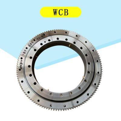 China Four Point Double Contact Row Ball Slewing Bearing Rotating Table Bearing for sale