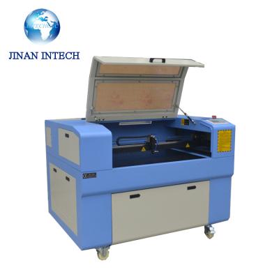 China Widely used laser engraving! ! ! cnc laser cutting machine price 600x900mm pantograph laser engraving machine for sale