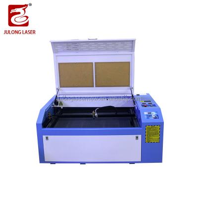 China Laser Engraving Liaocheng julong factory 9060 laser engraving and cutting machine working size 900*600mm for sale