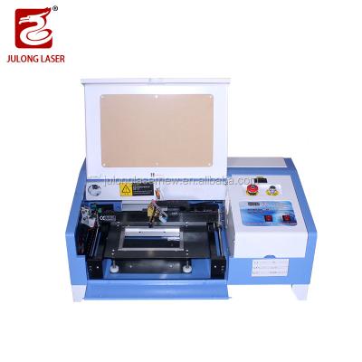 China Laser CUTTING Julong laser 3020 new laser cutting machine the equipment for automatic wood cutting machine zippo lighter for sale