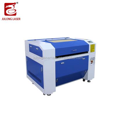 China Laser CUTTING Shandong Automatic Data Processing System Julong Laser 100w CO2 Laser Glass Engraving Machine With Rotary Device for sale