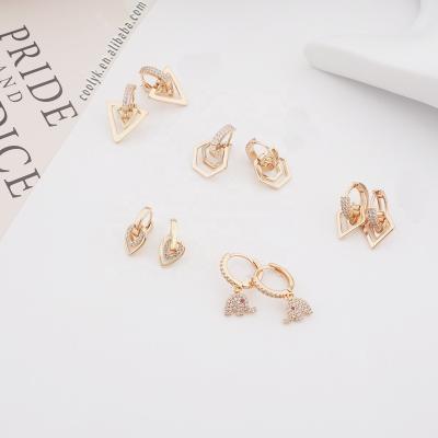 China TRENDY Handmade Anniversary Gift 14k Gold Filled Ice Out Plated Minimal Geometric Hollow Swirl Stud Earrings For Ladies for sale