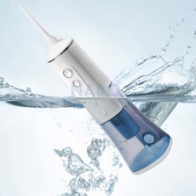 China Dental Art Rechargeable Oral Irrigator Flosser In-Water Brush Surface Irrigators for sale